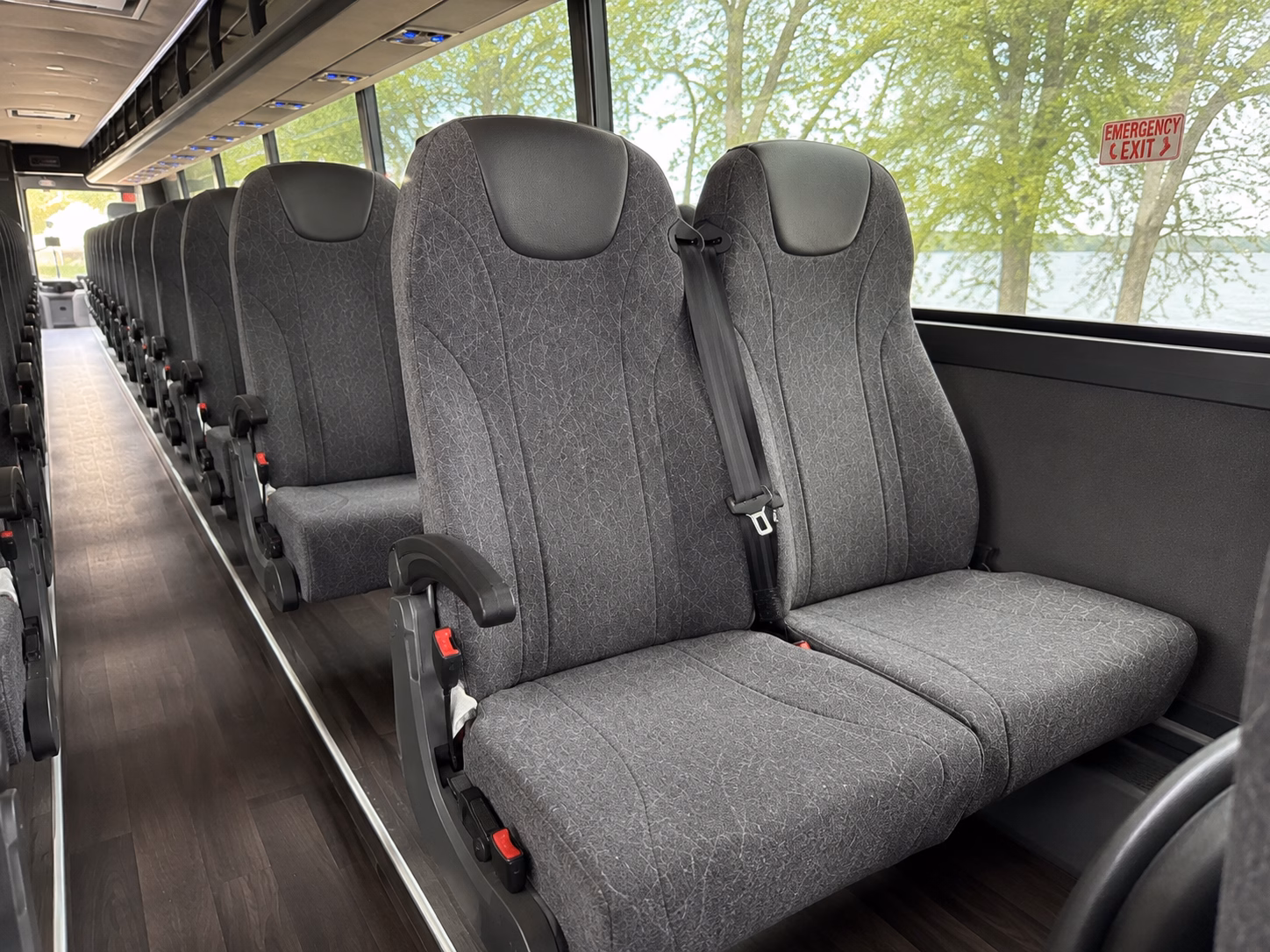 how your starting location and deadhead miles affect charter bus rates in springdale